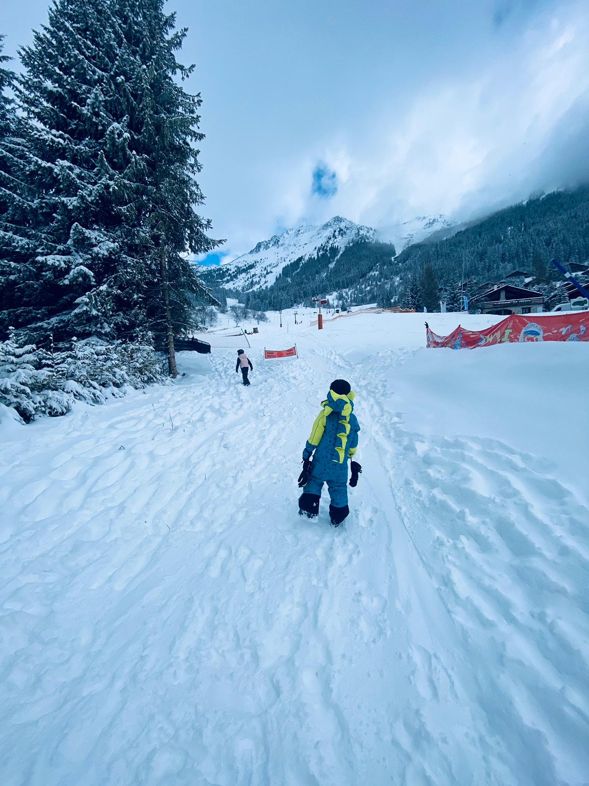 Kids walking in the snow