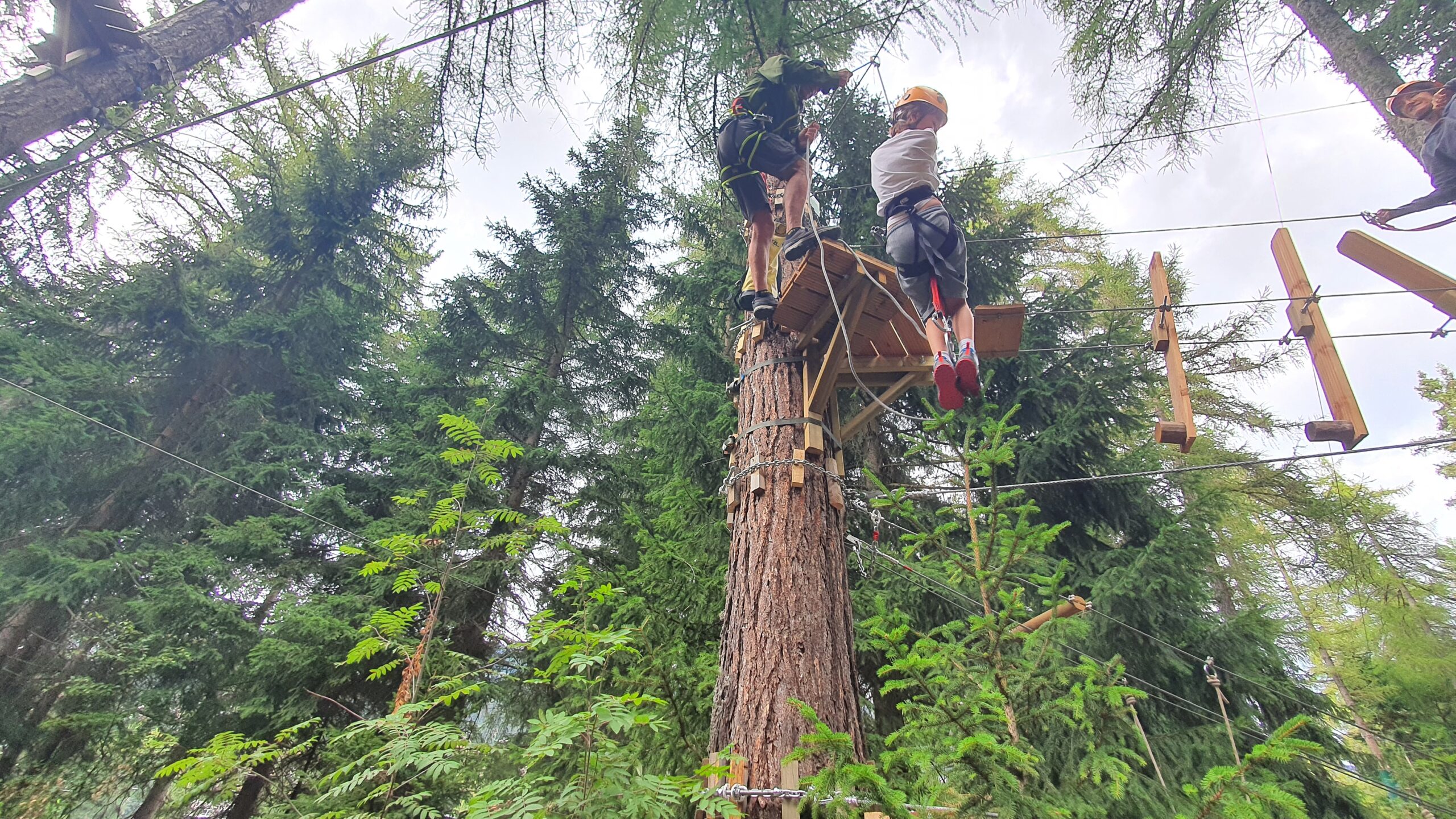 Kis doing zipline activity at summer camp