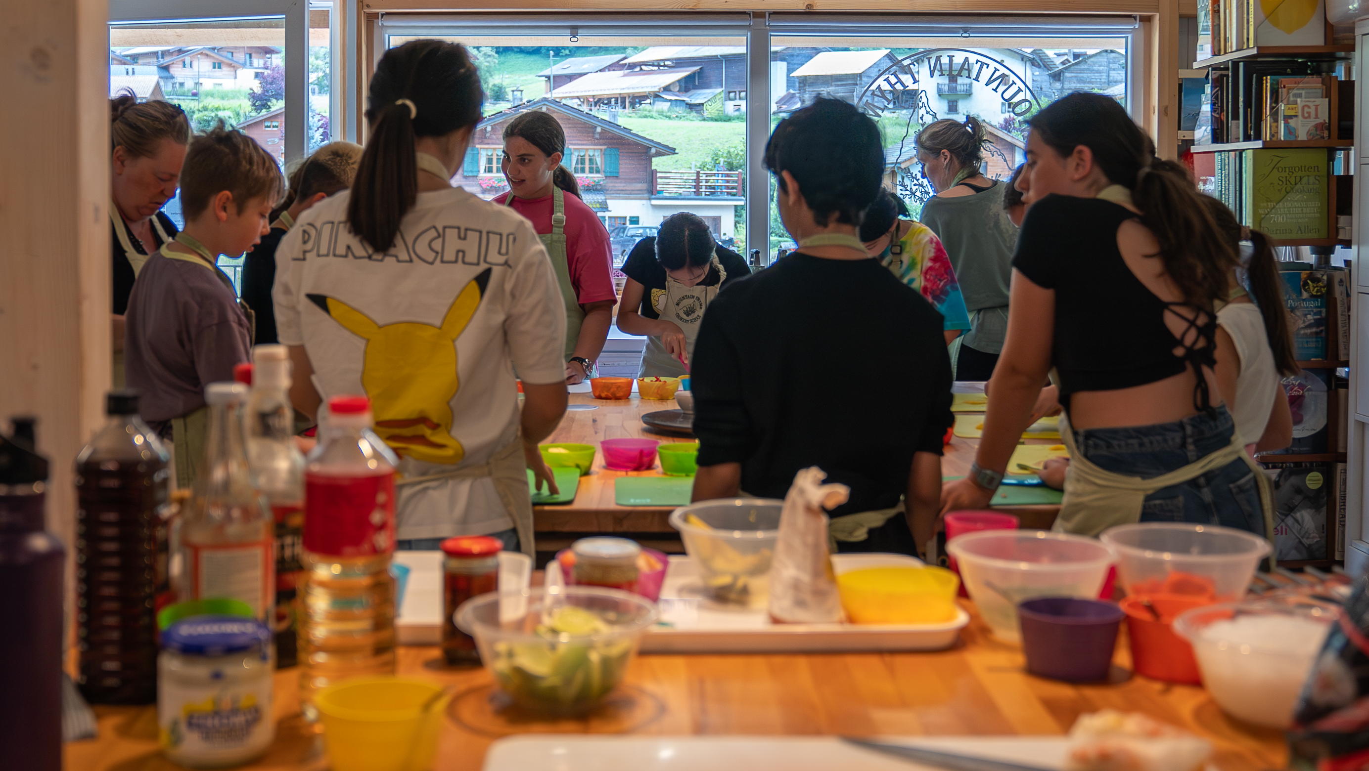 Kids cooking with different ingredients 