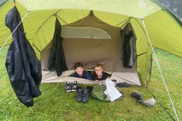 two teen boys in their tent on the Duke of edinburgh's expedition with Les Elfes International
