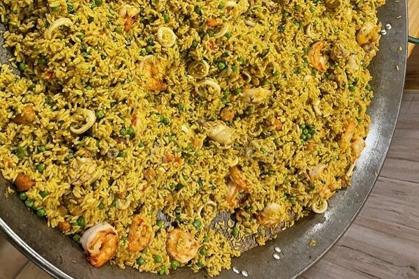 homemade paella cooked by les elfes international private chefs for summer camp kids & teens