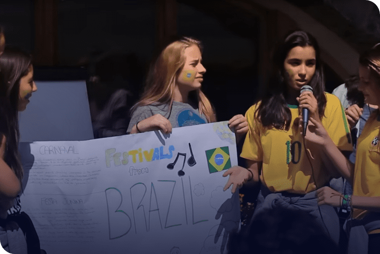 Group of brazilian kids describing Brazil to other teens at les Elfes international summer camp 2024