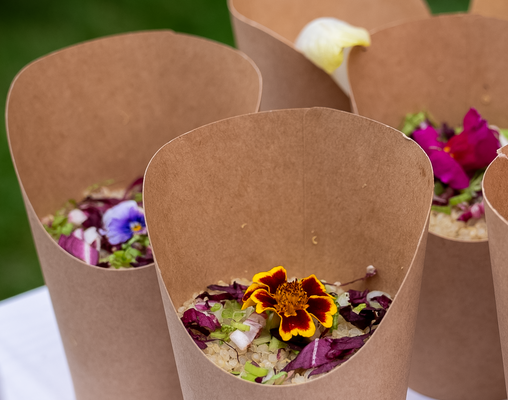 quinoa salad being presented in little cups during international day at les elfes international summer camp 2024
